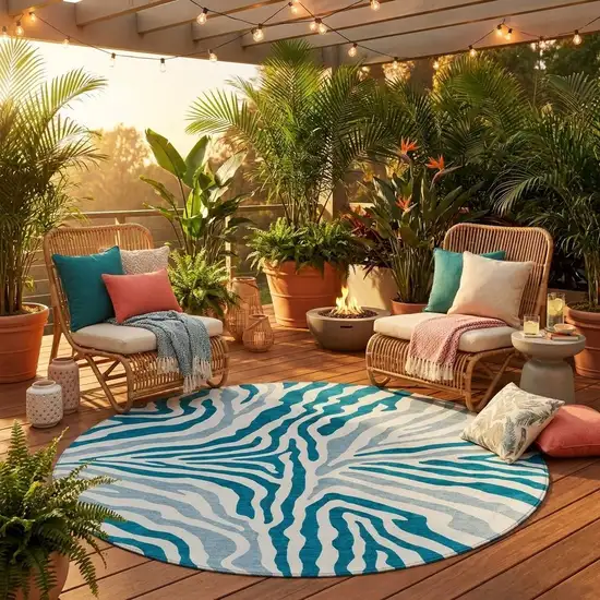 8' Teal Blue And Ivory Round Zebra Print Washable Indoor Outdoor Area Rug Photo 1