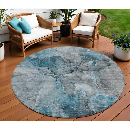 8' Teal Blue And Navy Blue Round Abstract Washable Indoor Outdoor Area Rug Photo 1