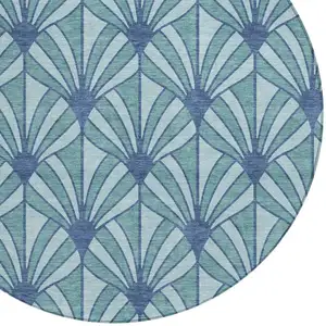 Photo of 8' Teal Blue And Navy Blue Round Seashell Washable Indoor Outdoor Area Rug