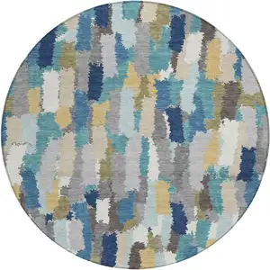 Photo of 8' Teal Blue And Navy Blue Round Striped Washable Indoor Outdoor Area Rug