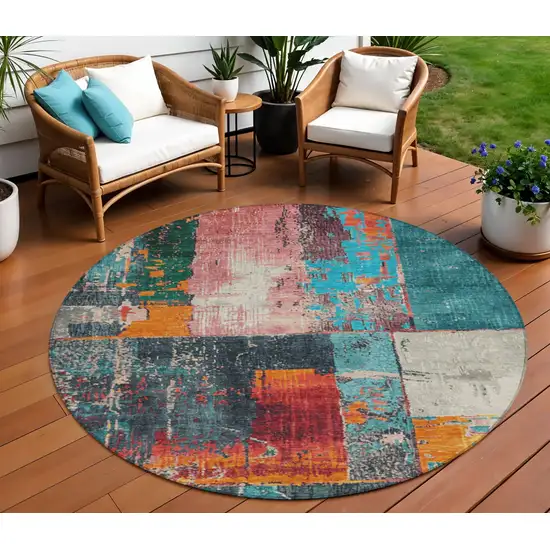 8' Teal Blue And Orange Round Abstract Washable Indoor Outdoor Area Rug Photo 2