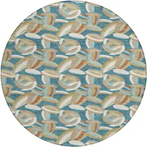 Photo of 8' Teal Blue And Orange Round Abstract Washable Indoor Outdoor Area Rug