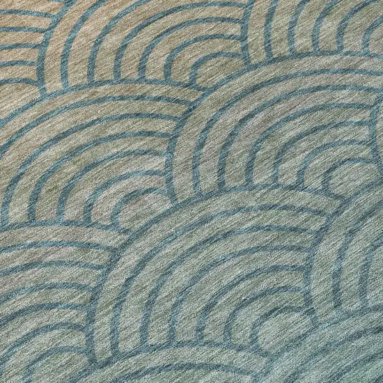 8' Teal Blue And Orange Round Geometric Washable Indoor Outdoor Area Rug Photo 9