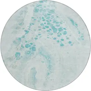 Photo of 8' Teal Blue And Pale Aqua Round Abstract Washable Indoor Outdoor Area Rug