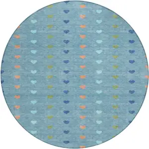 Photo of 8' Teal Blue And Peach Round Geometric Washable Indoor Outdoor Area Rug