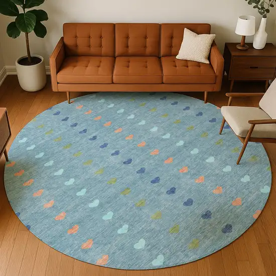 8' Teal Blue And Peach Round Geometric Washable Indoor Outdoor Area Rug Photo 5