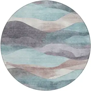 Photo of 8' Teal Blue And Plum Round Abstract Washable Indoor Outdoor Area Rug