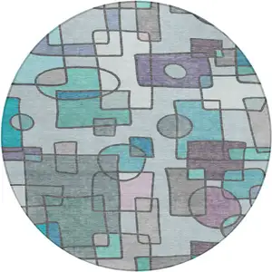 Photo of 8' Teal Blue And Plum Round Geometric Washable Indoor Outdoor Area Rug