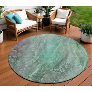 Photo of 8' Teal Blue And Purple Round Abstract Washable Indoor Outdoor Area Rug