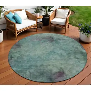 Photo of 8' Teal Blue And Purple Round Abstract Washable Indoor Outdoor Area Rug