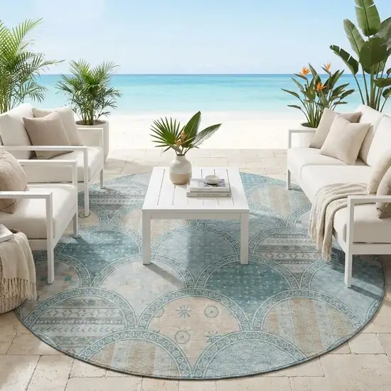 8' Teal Blue And Silver Round Geometric Washable Indoor Outdoor Area Rug Photo 1