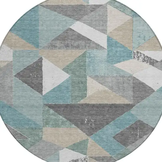 8' Teal Blue And Silver Round Geometric Washable Indoor Outdoor Area Rug Photo 1