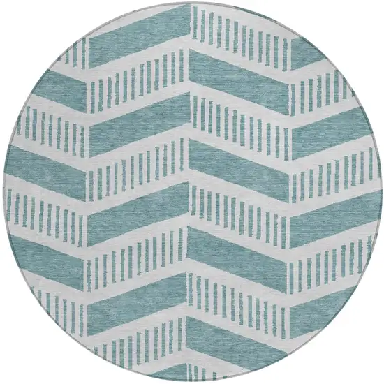 8' Teal Blue And Silver Round Geometric Washable Indoor Outdoor Area Rug Photo 1