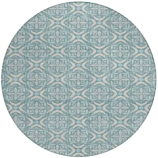 8' Teal Blue And Silver Round Geometric Washable Indoor Outdoor Area Rug Photo 1