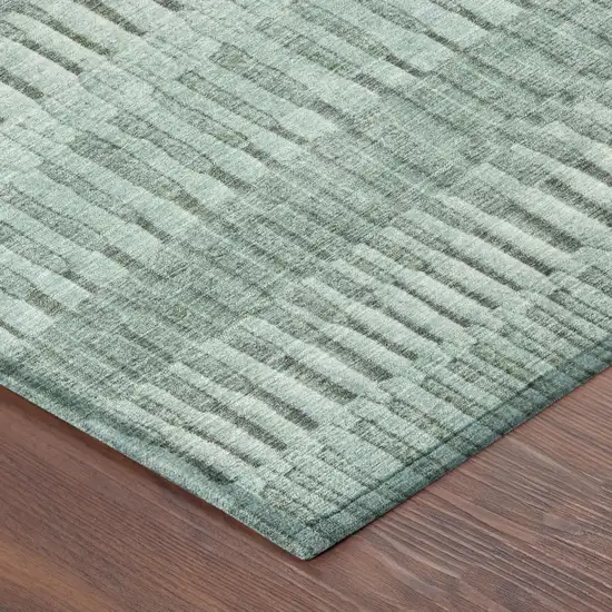 8' Teal Blue And Silver Round Striped Washable Indoor Outdoor Area Rug Photo 3