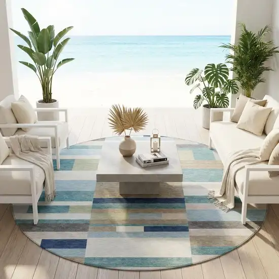 8' Teal Blue And Silver Round Striped Washable Indoor Outdoor Area Rug Photo 1