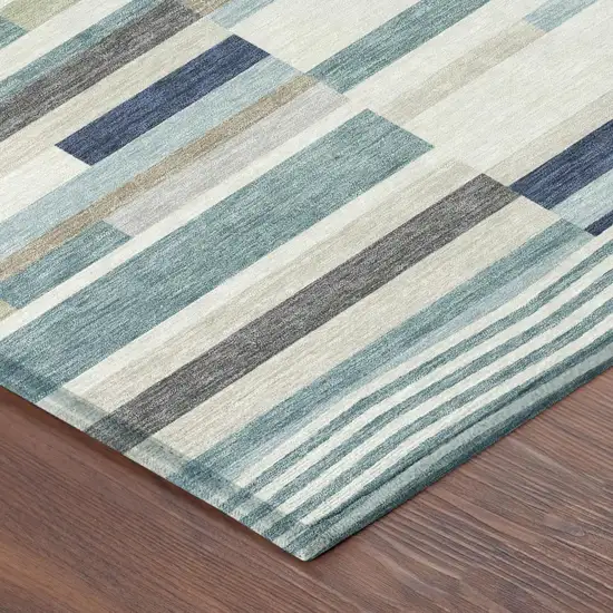 8' Teal Blue And Silver Round Striped Washable Indoor Outdoor Area Rug Photo 3