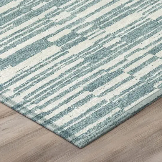 8' Teal Blue And Silver Round Striped Washable Indoor Outdoor Area Rug Photo 4