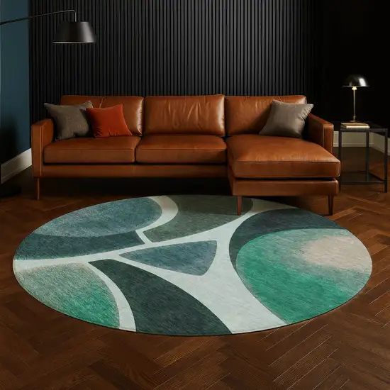 8' Teal Blue And Turquoise Round Abstract Washable Indoor Outdoor Area Rug Photo 4