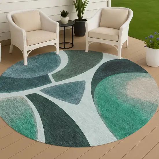 8' Teal Blue And Turquoise Round Abstract Washable Indoor Outdoor Area Rug Photo 3