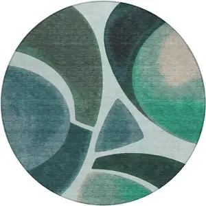 Photo of 8' Teal Blue And Turquoise Round Abstract Washable Indoor Outdoor Area Rug