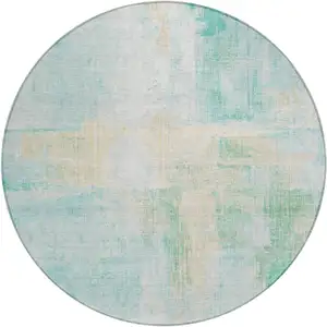 Photo of 8' Teal Blue And Wheat Round Abstract Washable Indoor Outdoor Area Rug
