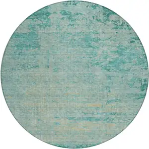 Photo of 8' Teal Blue And Wheat Round Abstract Washable Indoor Outdoor Area Rug