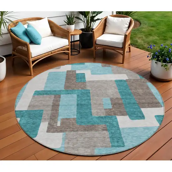 8' Teal Blue Aqua And Beige Round Abstract Washable Indoor Outdoor Area Rug Photo 1