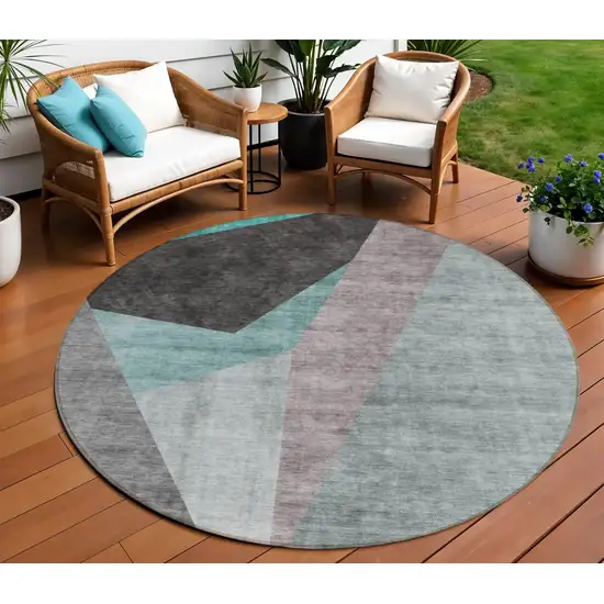 8' Teal Blue Aqua And Charcoal Round Abstract Washable Indoor Outdoor Area Rug Photo 1