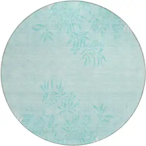 Photo of 8' Teal Blue Aqua And Ivory Round Floral Washable Indoor Outdoor Area Rug
