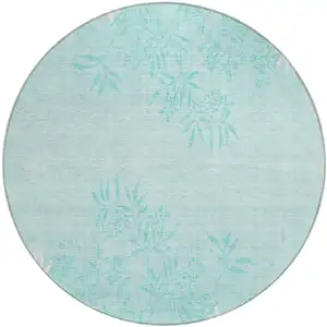 Photo of 8' Teal Blue Aqua And Ivory Round Floral Washable Indoor Outdoor Area Rug