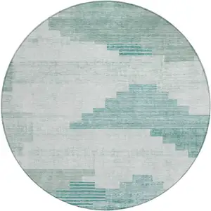 Photo of 8' Teal Blue Aqua And Ivory Round Geometric Washable Indoor Outdoor Area Rug