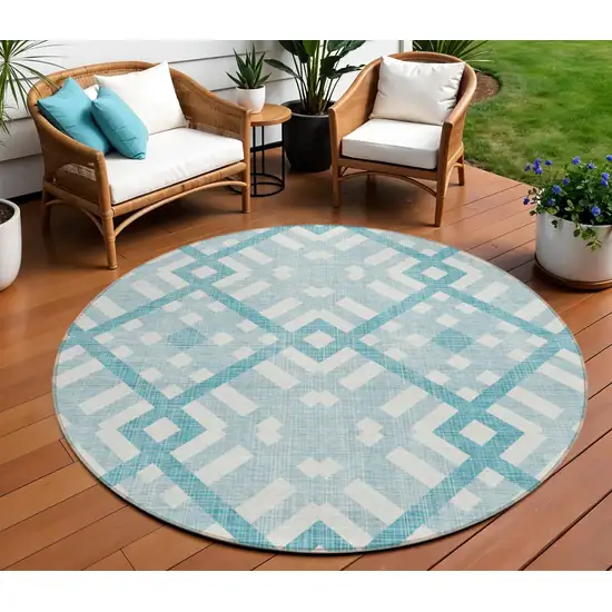 8' Teal Blue Aqua And Ivory Round Geometric Washable Indoor Outdoor Area Rug Photo 1