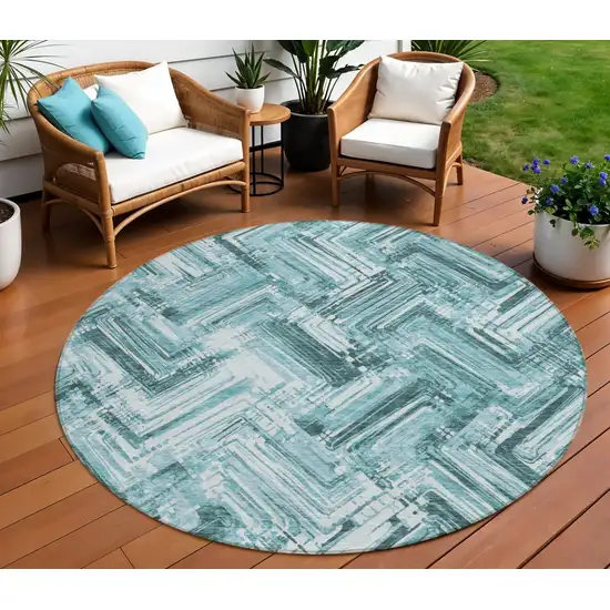 8' Teal Blue Aqua And Ivory Round Geometric Washable Indoor Outdoor Area Rug Photo 1