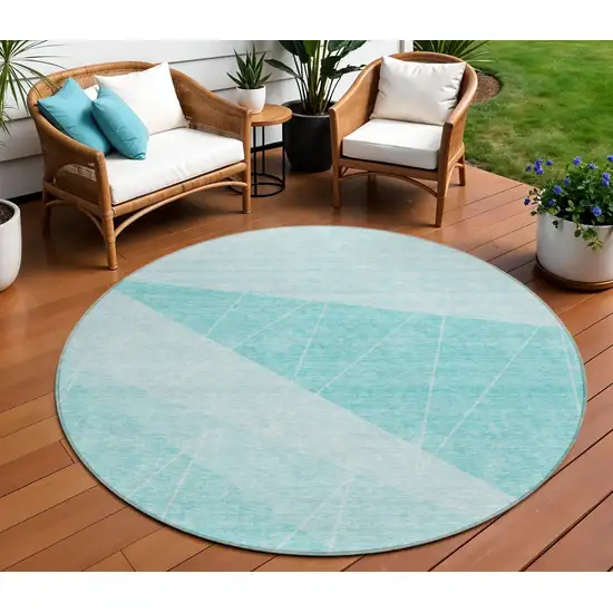 8' Teal Blue Aqua And Ivory Round Geometric Washable Indoor Outdoor Area Rug Photo 1