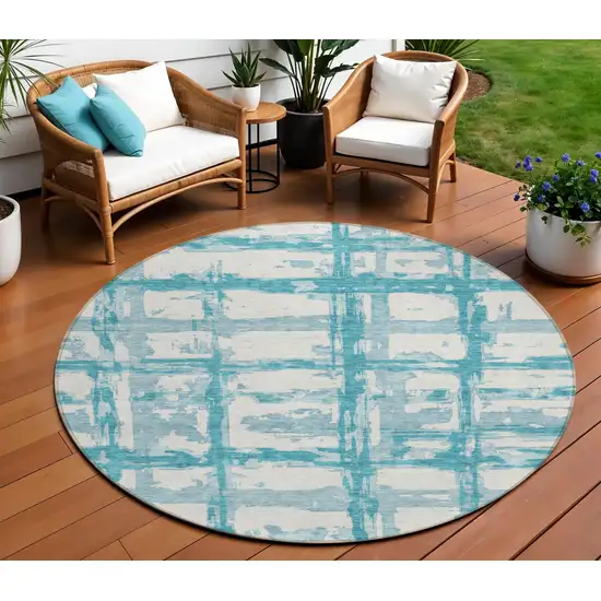 8' Teal Blue Aqua And Ivory Round Striped Washable Indoor Outdoor Area Rug Photo 1
