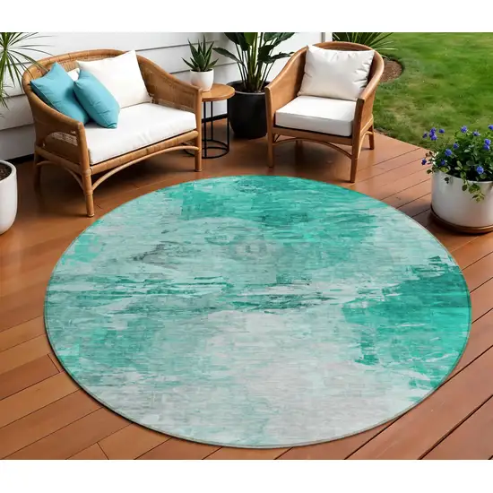 8' Teal Blue Aqua And Silver Round Abstract Washable Indoor Outdoor Area Rug Photo 1
