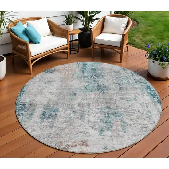 8' Teal Blue Beige And Copper Round Abstract Washable Indoor Outdoor Area Rug Photo 1