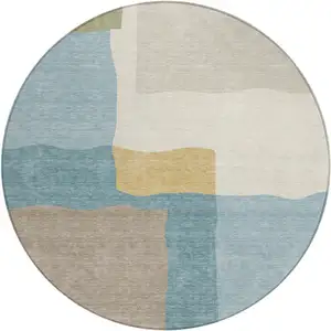 Photo of 8' Teal Blue Beige And Ivory Round Abstract Washable Indoor Outdoor Area Rug
