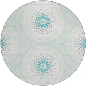 Photo of 8' Teal Blue Beige And Ivory Round Floral Medallion Washable Indoor Outdoor Area Rug
