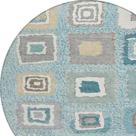 8' Teal Blue Beige And Ivory Round Geometric Washable Indoor Outdoor Area Rug Photo 4