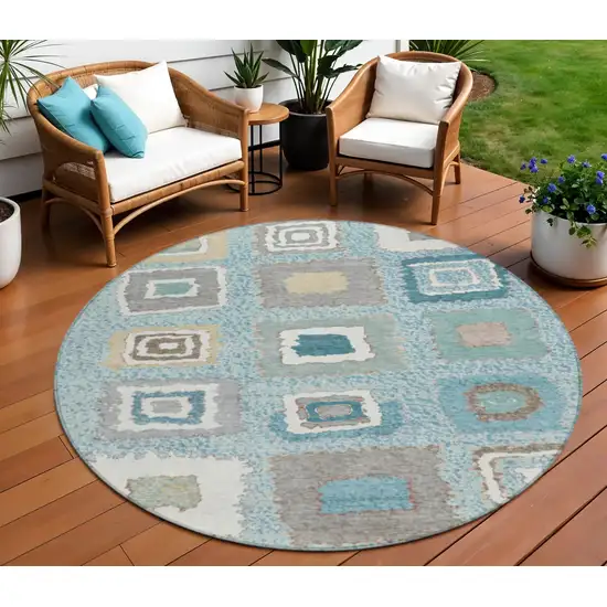 8' Teal Blue Beige And Ivory Round Geometric Washable Indoor Outdoor Area Rug Photo 2