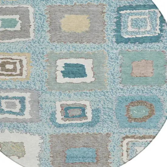 8' Teal Blue Beige And Ivory Round Geometric Washable Indoor Outdoor Area Rug Photo 8
