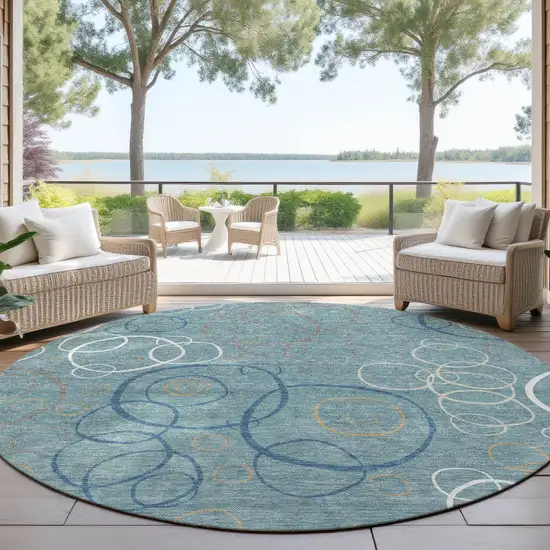 8' Teal Blue Beige And Ivory Round Geometric Washable Indoor Outdoor Area Rug Photo 4