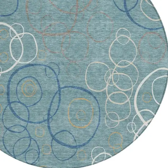 8' Teal Blue Beige And Ivory Round Geometric Washable Indoor Outdoor Area Rug Photo 2