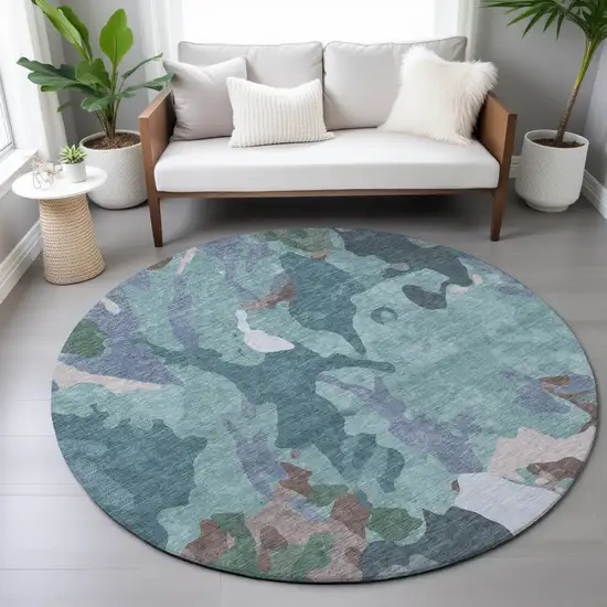 8' Teal Blue Beige And Pale Aqua Round Abstract Washable Indoor Outdoor Area Rug Photo 9