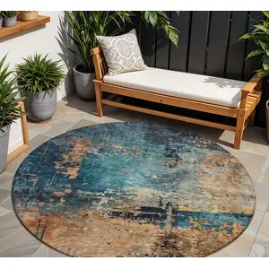 Photo of 8' Teal Blue Black And Copper Round Abstract Washable Indoor Outdoor Area Rug