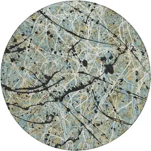 Photo of 8' Teal Blue Black And Ivory Round Abstract Washable Indoor Outdoor Area Rug