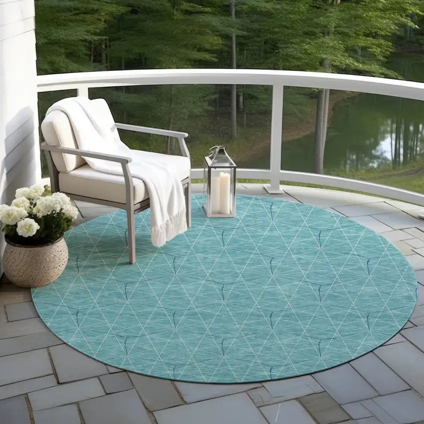 8' Teal Blue Black And Ivory Round Geometric Washable Indoor Outdoor Area Rug Photo 6