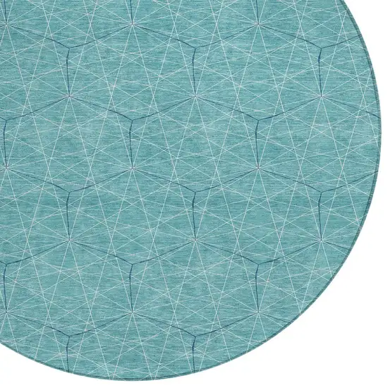 8' Teal Blue Black And Ivory Round Geometric Washable Indoor Outdoor Area Rug Photo 4